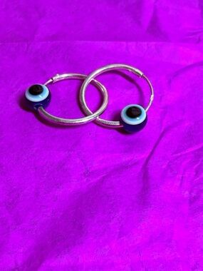 Sterling silver hoops protective eye